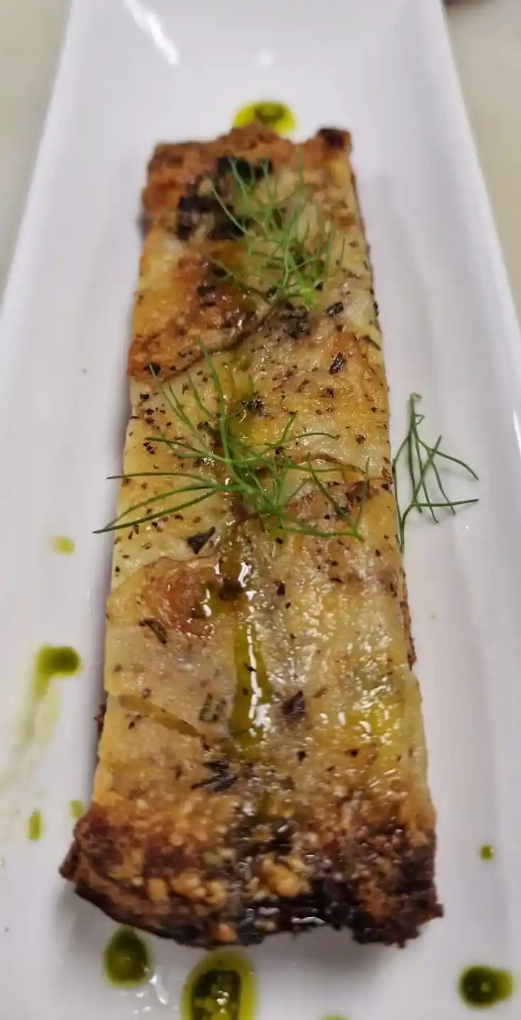 Dauphinoise Potatoes oven baked with mild cheddar cheese