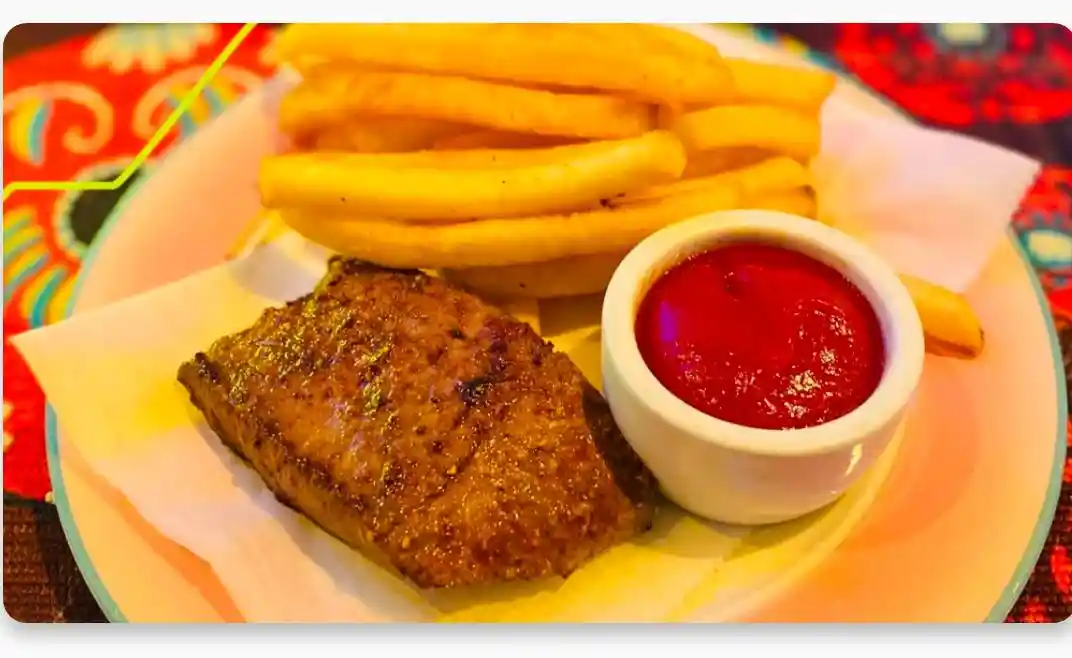 GRILLED STEAK OVER FRIES